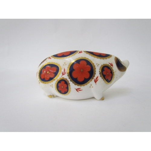 7499 - A pair of Royal Crown Derby paperweights as Tortoises, gold stoppers and a Royal Crown Derby paperwe... 