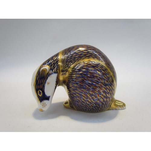 7500 - A Royal Crown Derby badger paperweight, gold stopper and a Royal Crown Derby paperweight as a Hedgeh... 