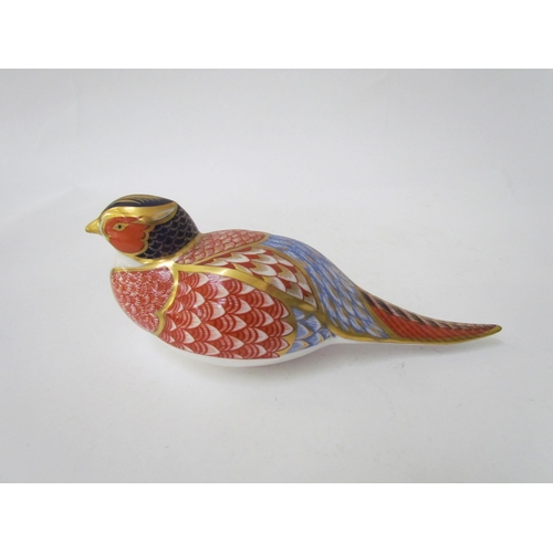 7502 - A Royal Crown Derby paperweight as a Pheasant, gold stopper and a Royal Crown Derby paperweight as a... 