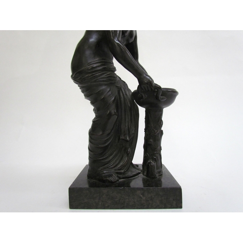 7509 - A late 19th Century French Grand Tour style bronze figure of Danaides with a bowl. The female figure... 