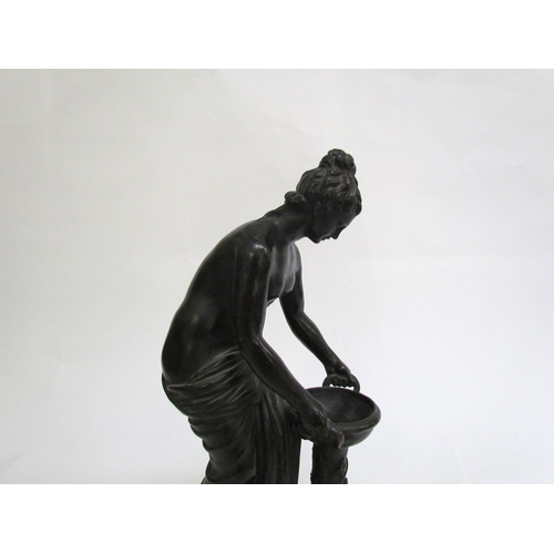 7509 - A late 19th Century French Grand Tour style bronze figure of Danaides with a bowl. The female figure... 