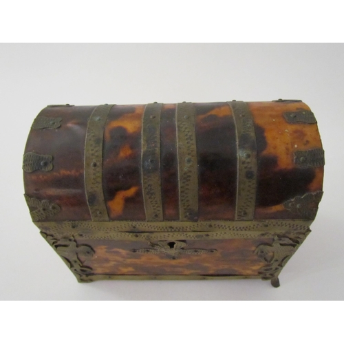 7514 - A 19th Century tortoiseshell dome top metal bound casket, 14cm x 12cm x 8cm, one foot missing