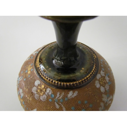 7524 - A Cobridge Stoneware onion shaped vase in mottled blue glaze with bunches of grapes and vine leaf de... 