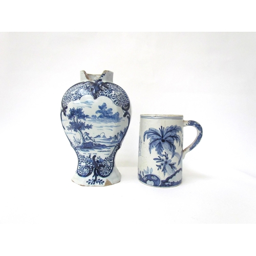 7529 - Two 19th Century or earlier Delft items, tankard with armorial crest, 14cm high, vase with figural s... 