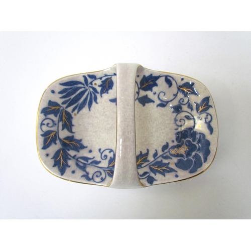 7531 - A Charlotte Rhead jug, two leaf form plates and basket dish pattern.  TL40 (4)  (E)  £30-40