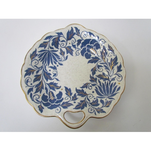 7531 - A Charlotte Rhead jug, two leaf form plates and basket dish pattern.  TL40 (4)  (E)  £30-40