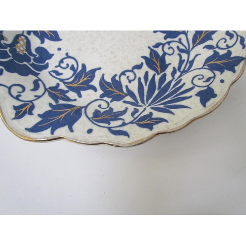 7531 - A Charlotte Rhead jug, two leaf form plates and basket dish pattern.  TL40 (4)  (E)  £30-40