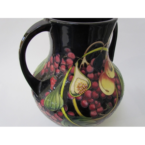 7536 - A Moorcroft Queen's Choice pattern large twin handled vase, by Emma Bossons. Second, 34cm tall  (R) ... 