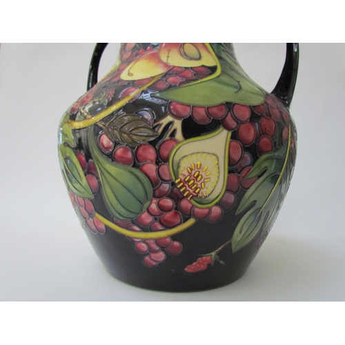 7536 - A Moorcroft Queen's Choice pattern large twin handled vase, by Emma Bossons. Second, 34cm tall  (R) ... 