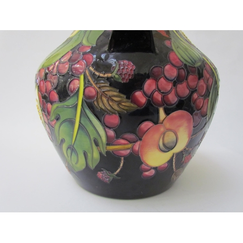 7536 - A Moorcroft Queen's Choice pattern large twin handled vase, by Emma Bossons. Second, 34cm tall  (R) ... 