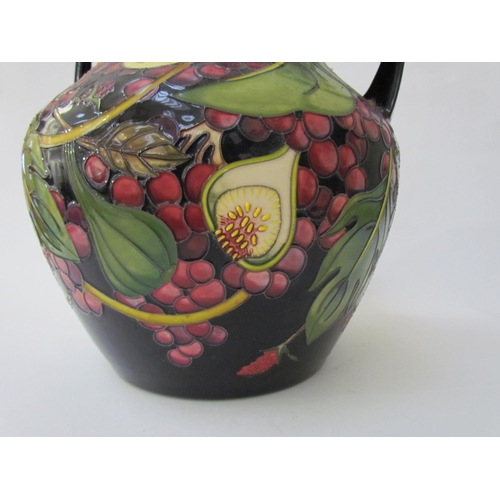 7536 - A Moorcroft Queen's Choice pattern large twin handled vase, by Emma Bossons. Second, 34cm tall  (R) ... 