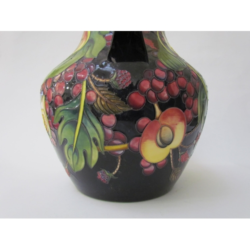 7536 - A Moorcroft Queen's Choice pattern large twin handled vase, by Emma Bossons. Second, 34cm tall  (R) ... 