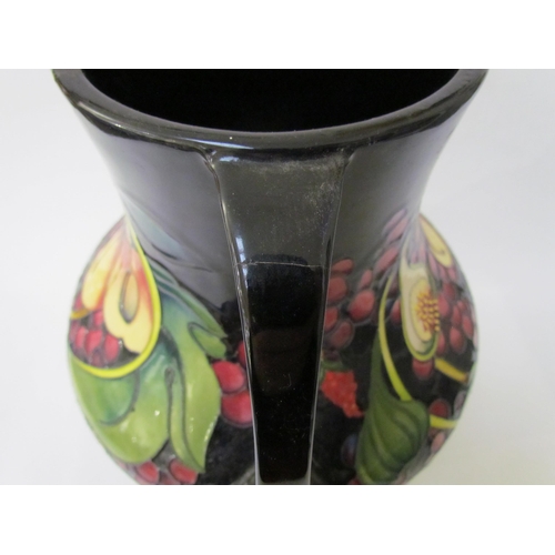 7536 - A Moorcroft Queen's Choice pattern large twin handled vase, by Emma Bossons. Second, 34cm tall  (R) ... 