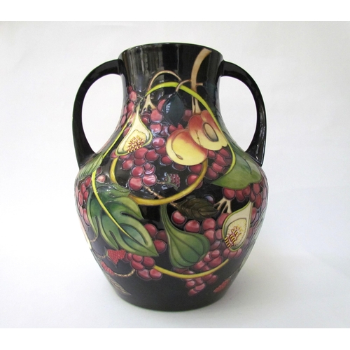 7536 - A Moorcroft Queen's Choice pattern large twin handled vase, by Emma Bossons. Second, 34cm tall  (R) ... 