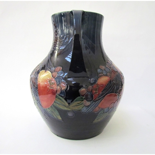 7541 - A Moorcroft Finch and Berries on blue large twin handled vase, 34cm tall  (R)  £350 NEXT SPECIAL