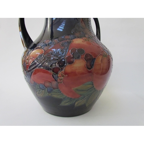 7541 - A Moorcroft Finch and Berries on blue large twin handled vase, 34cm tall  (R)  £350 NEXT SPECIAL