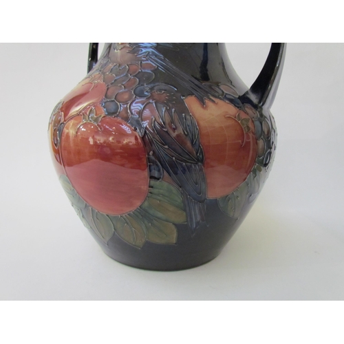 7541 - A Moorcroft Finch and Berries on blue large twin handled vase, 34cm tall  (R)  £350 NEXT SPECIAL