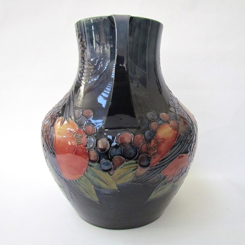 7541 - A Moorcroft Finch and Berries on blue large twin handled vase, 34cm tall  (R)  £350 NEXT SPECIAL