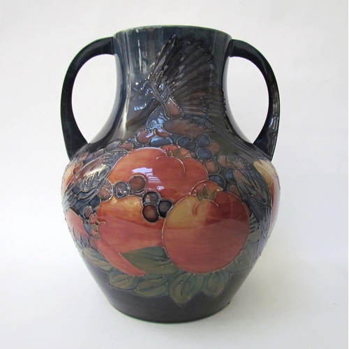 7541 - A Moorcroft Finch and Berries on blue large twin handled vase, 34cm tall  (R)  £350 NEXT SPECIAL