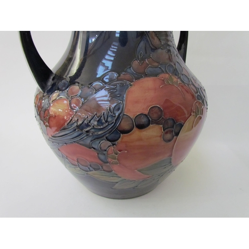 7541 - A Moorcroft Finch and Berries on blue large twin handled vase, 34cm tall  (R)  £350 NEXT SPECIAL