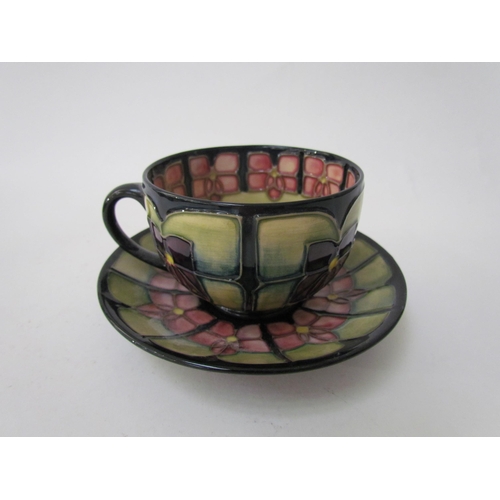 7556 - A Moorcroft Violet pattern tea service for two