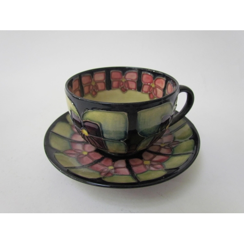 7556 - A Moorcroft Violet pattern tea service for two