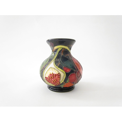 7560 - A Moorcroft Queen's Choice pattern vase, designed by Emma Bossons, 9.5cm tall