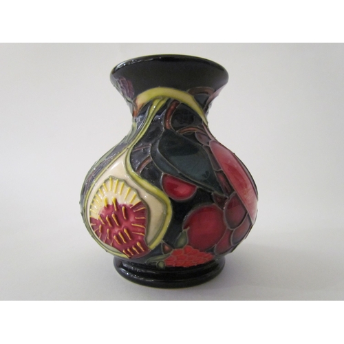 7560 - A Moorcroft Queen's Choice pattern vase, designed by Emma Bossons, 9.5cm tall