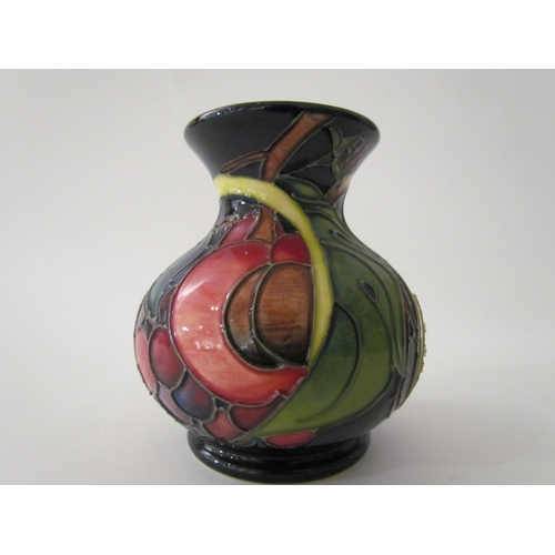 7560 - A Moorcroft Queen's Choice pattern vase, designed by Emma Bossons, 9.5cm tall