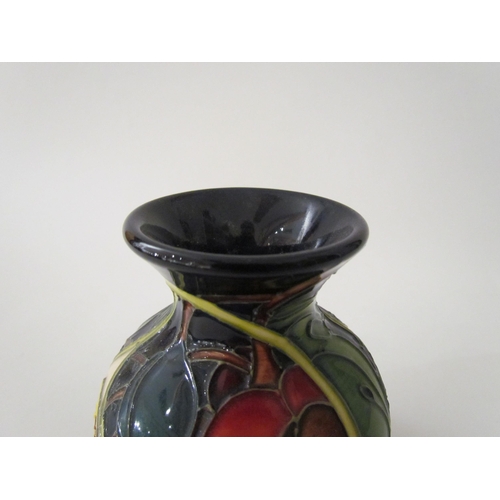 7560 - A Moorcroft Queen's Choice pattern vase, designed by Emma Bossons, 9.5cm tall