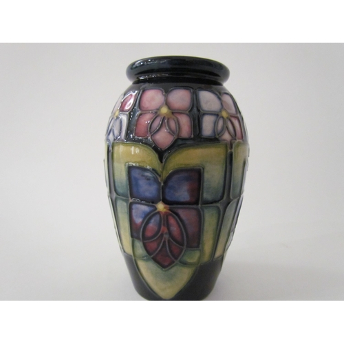 7561 - A Moorcroft Violet pattern vase of small proportions, 11cm tall