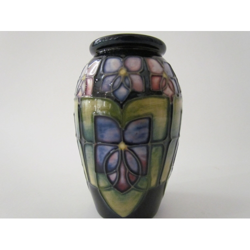 7561 - A Moorcroft Violet pattern vase of small proportions, 11cm tall