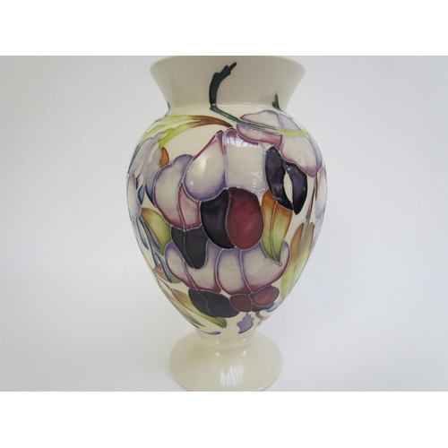 7563 - A Moorcroft vase designed by Emma Bossons, Purple Wisteria, 18cm tall  (R)  £60