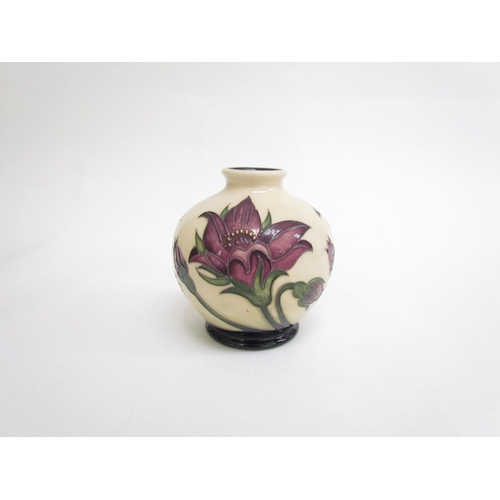 7567 - A Moorcroft Collectors Club vase decorated with pink flowers, designed by Emma Bossons 2013, 11cm ta... 