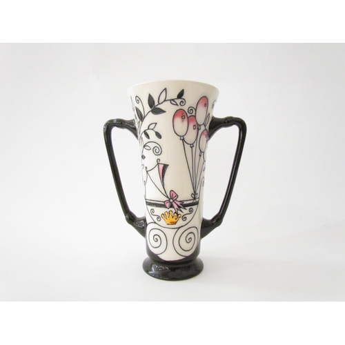 7570 - A Moorcroft Royal Joy Princess Charlotte design twin handled vase designed by Nicola Slaney, 15.5cm ... 