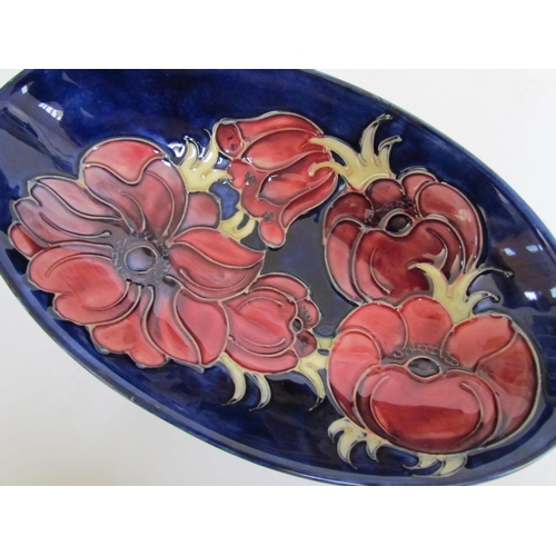 7576 - A Moorcroft Anemone pattern oval shallow bowl, 23cm x 13.5cm