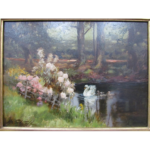 7589 - JOHN WILLIAM SCHOFIELD (1865-1944): An oil on panel of swan and signets in woodland pond, 25cm x 34c... 