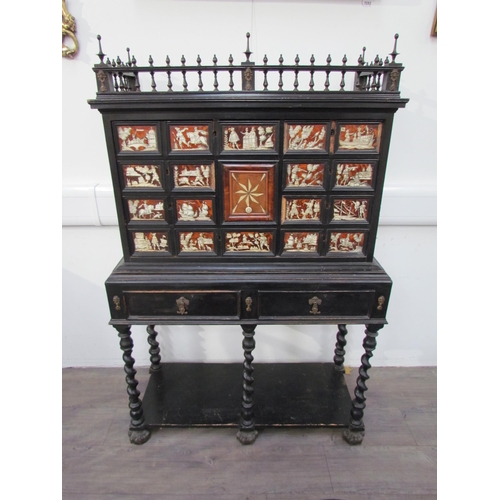 7594 - An 18th Century European cabinet on stand, the spindle rail cornice over an eight drawer and single ... 