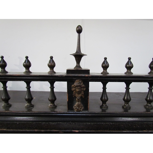 7594 - An 18th Century European cabinet on stand, the spindle rail cornice over an eight drawer and single ... 