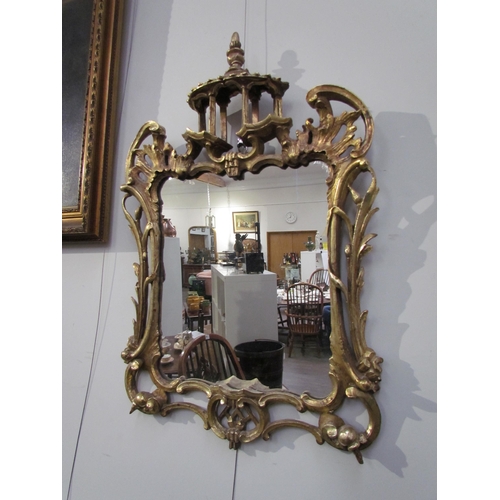 7595 - A Chippendale style mirror with later mirror plate, 66cm high