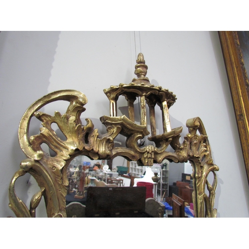 7595 - A Chippendale style mirror with later mirror plate, 66cm high