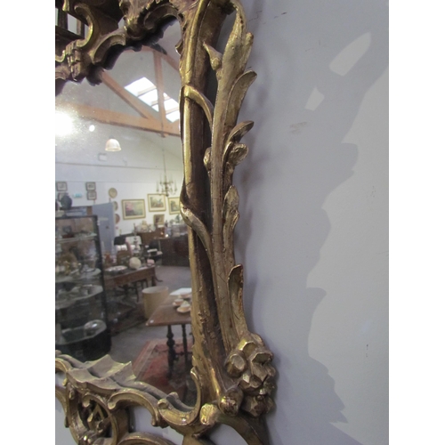 7595 - A Chippendale style mirror with later mirror plate, 66cm high