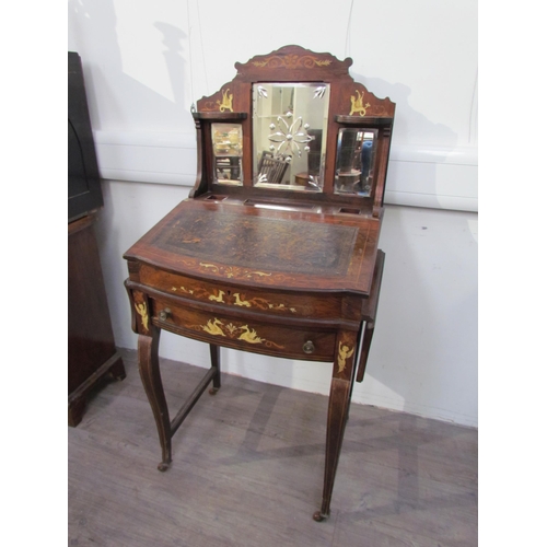 7599 - A 19th Century rosewood veneer desk inlaid with scrolled marquetry including ivory, cut glass mirror... 