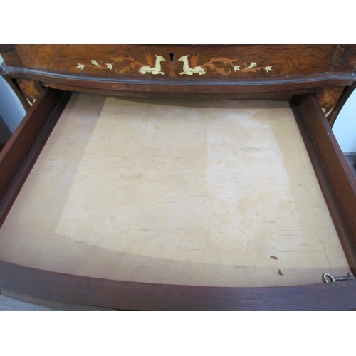 7599 - A 19th Century rosewood veneer desk inlaid with scrolled marquetry including ivory, cut glass mirror... 