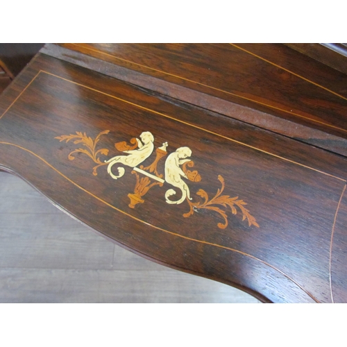 7599 - A 19th Century rosewood veneer desk inlaid with scrolled marquetry including ivory, cut glass mirror... 