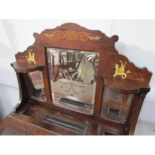 7599 - A 19th Century rosewood veneer desk inlaid with scrolled marquetry including ivory, cut glass mirror... 