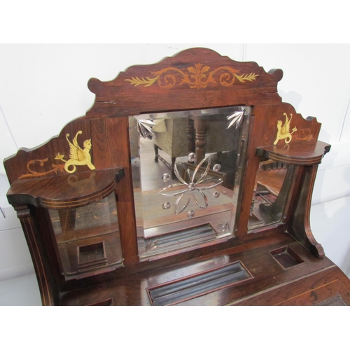 7599 - A 19th Century rosewood veneer desk inlaid with scrolled marquetry including ivory, cut glass mirror... 