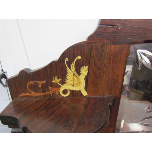 7599 - A 19th Century rosewood veneer desk inlaid with scrolled marquetry including ivory, cut glass mirror... 