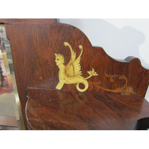 7599 - A 19th Century rosewood veneer desk inlaid with scrolled marquetry including ivory, cut glass mirror... 