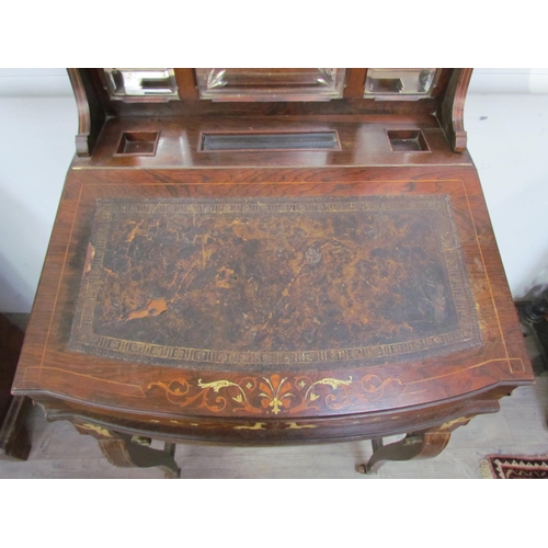 7599 - A 19th Century rosewood veneer desk inlaid with scrolled marquetry including ivory, cut glass mirror... 